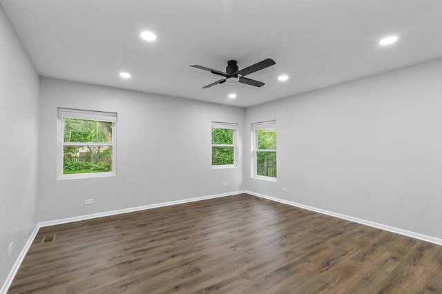 5S542 Tartan Ln, Naperville, IL 60563 - spare room featuring baseboards, dark wood-style floors, recessed lighting, and a ceiling fan