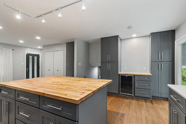 5S542 Tartan Ln, Naperville, IL 60563 - kitchen featuring rail lighting, beverage cooler, butcher block countertops, gray cabinets, and recessed lighting