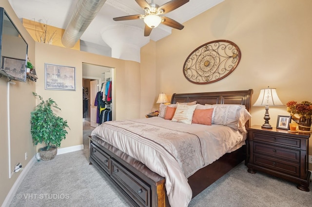 1530 S State St Unit 408, Chicago, IL 60605 - bedroom with light colored carpet, a spacious closet, a closet, baseboards, and ceiling fan