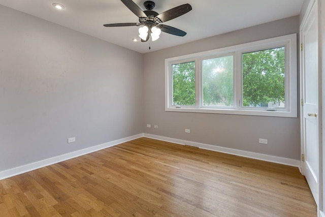 415 Honey Locust Ln, Willowbrook, IL 60527 - spare room with baseboards, light wood-type flooring, ceiling fan, and recessed lighting