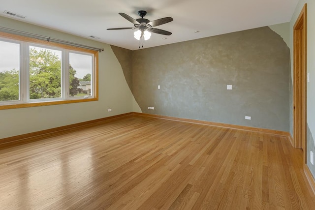 415 Honey Locust Ln, Willowbrook, IL 60527 - unfurnished room with light wood-style floors, ceiling fan, and baseboards