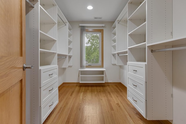 415 Honey Locust Ln, Willowbrook, IL 60527 - walk in closet featuring light wood finished floors
