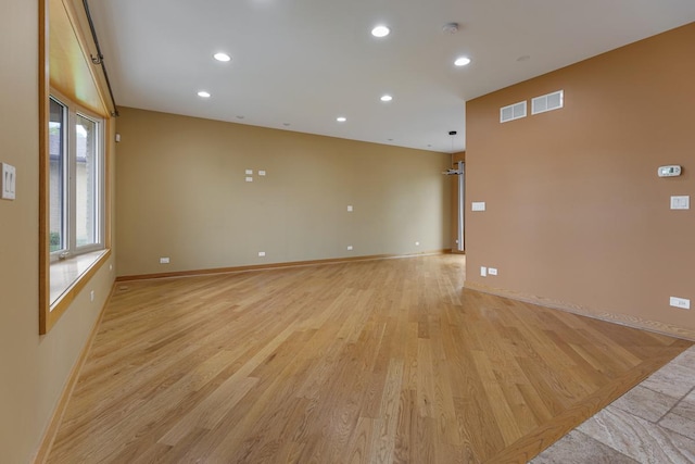 415 Honey Locust Ln, Willowbrook, IL 60527 - unfurnished room with light wood-style floors, recessed lighting, baseboards, and a smoke detector