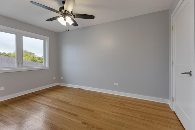 415 Honey Locust Ln, Willowbrook, IL 60527 - unfurnished room featuring ceiling fan, light wood-style floors, and baseboards