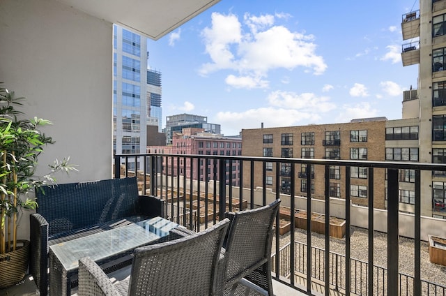 210 S Desplaines St Unit 706, Chicago, IL 60661 - balcony featuring a city view