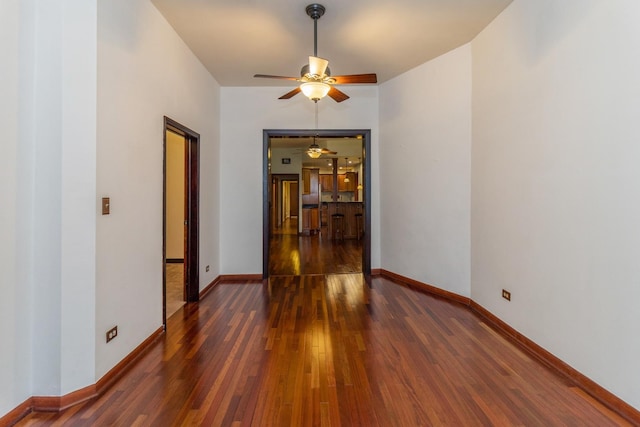 4419 S Wallace St, Chicago, IL 60609 - spare room featuring ceiling fan, hardwood / wood-style floors, and baseboards