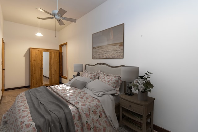 4419 S Wallace St, Chicago, IL 60609 - bedroom featuring baseboards, ceiling fan, and light colored carpet