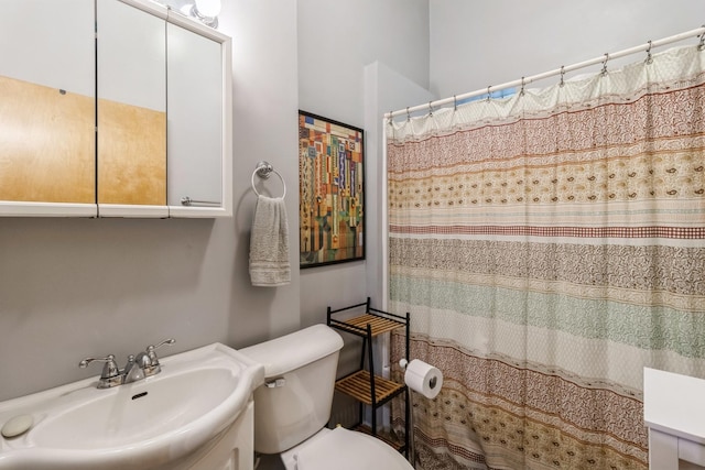 4419 S Wallace St, Chicago, IL 60609 - bathroom featuring toilet, vanity, and a shower with curtain