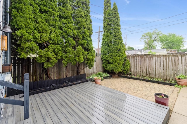 4419 S Wallace St, Chicago, IL 60609 - wooden deck featuring a fenced backyard and a patio area