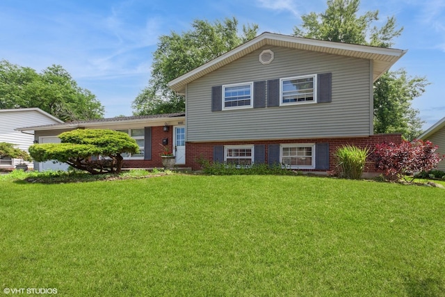 6805 Roberts Dr, Woodridge, IL 60517 - tri-level home featuring a front lawn and brick siding
