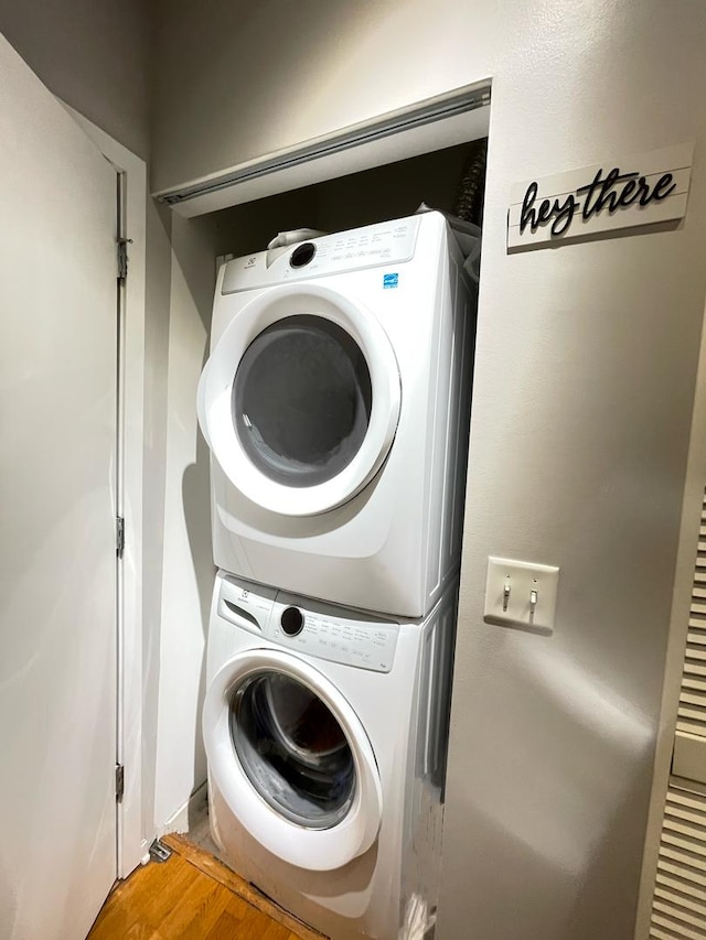 2323 W Pershing Rd Unit 421, Chicago, IL 60609 - laundry room featuring estacked washer and dryer