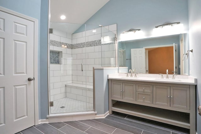1437 Sturgeon Bay Ct, Schaumburg, IL 60173 - full bathroom with vaulted ceiling, double vanity, a shower stall, wood finish floors, and baseboards