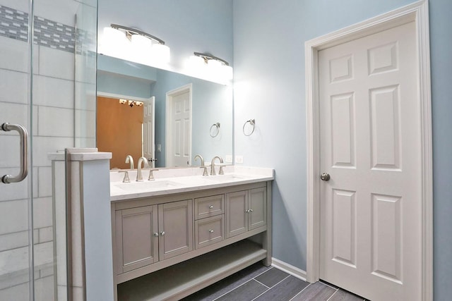 1437 Sturgeon Bay Ct, Schaumburg, IL 60173 - bathroom with double vanity, a shower stall, and baseboards