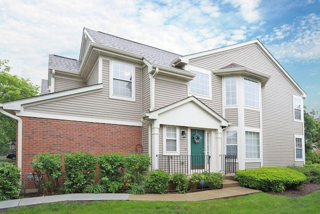1437 Sturgeon Bay Ct, Schaumburg, IL 60173 - view of front of property featuring brick siding and a shingled roof