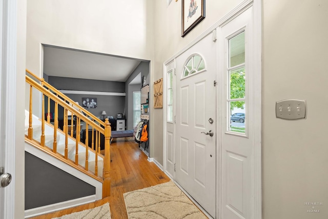 1101 Paul Ct, Fox River Grove, IL 60021 - foyer with wood finished floors, stairway, and a high ceiling