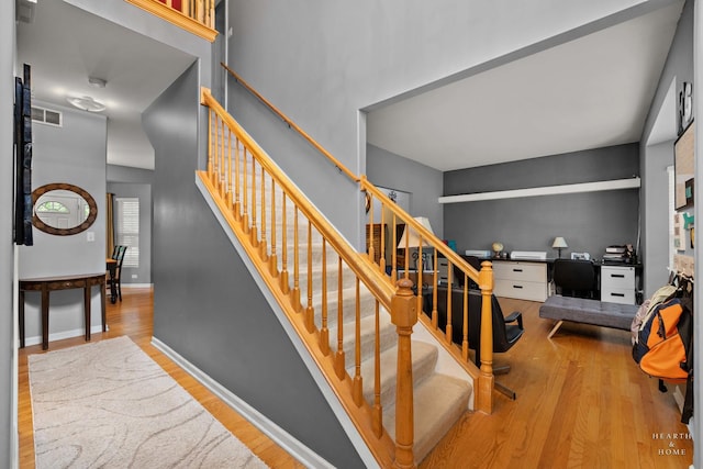 1101 Paul Ct, Fox River Grove, IL 60021 - stairs with wood finished floors and baseboards