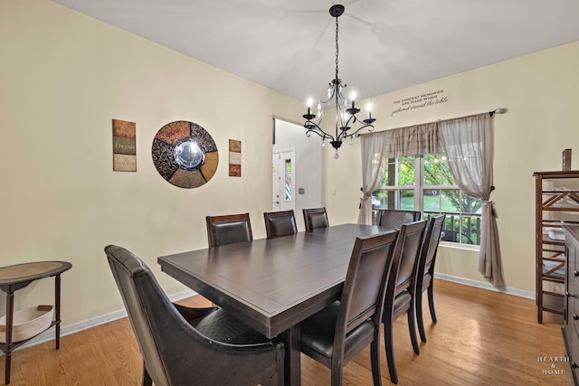 1101 Paul Ct, Fox River Grove, IL 60021 - dining space with a chandelier, light wood finished floors, and baseboards