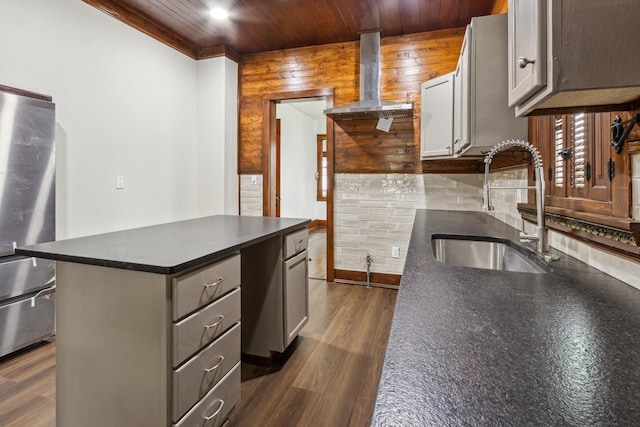1006 W 1st St, Dixon, IL 61021 - kitchen featuring a sink, dark countertops, extractor fan, wooden ceiling, and backsplash