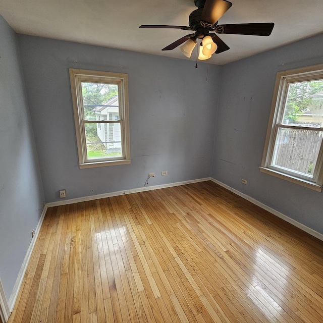 237 Pine St, Villa Park, IL 60181 - unfurnished room with healthy amount of natural light, hardwood / wood-style flooring, and baseboards