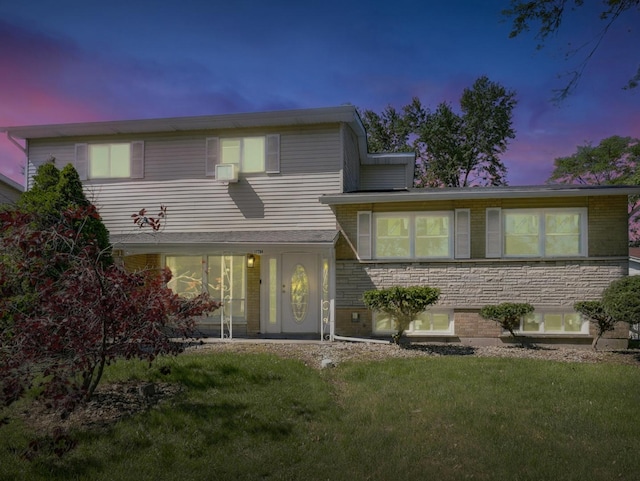 17704 Grandview Dr, Hazel Crest, IL 60429 - split level home featuring a yard and brick siding