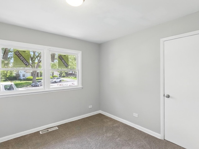 17704 Grandview Dr, Hazel Crest, IL 60429 - unfurnished room featuring dark carpet and baseboards