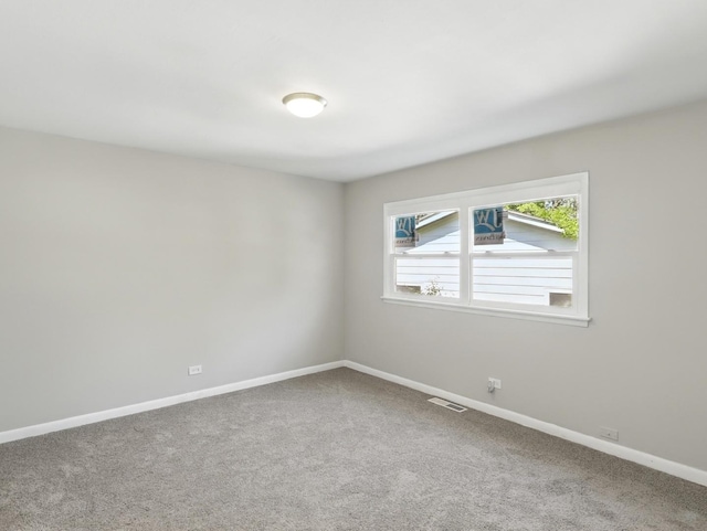 17704 Grandview Dr, Hazel Crest, IL 60429 - carpeted spare room with baseboards