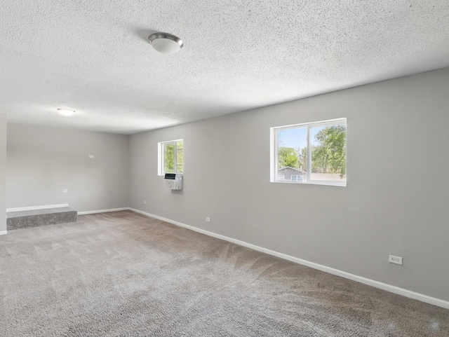 17704 Grandview Dr, Hazel Crest, IL 60429 - empty room featuring baseboards, carpet, and a textured ceiling