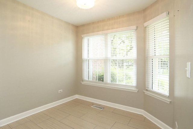 339 Ashford Cir Unit 1, Bartlett, IL 60103 - empty room with healthy amount of natural light and baseboards