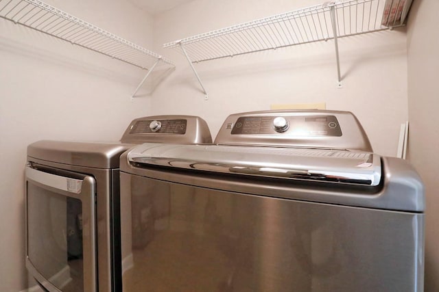 339 Ashford Cir Unit 1, Bartlett, IL 60103 - laundry room with washer and clothes dryer