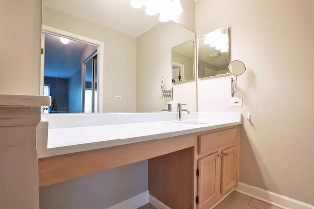 339 Ashford Cir Unit 1, Bartlett, IL 60103 - bathroom featuring vanity and baseboards