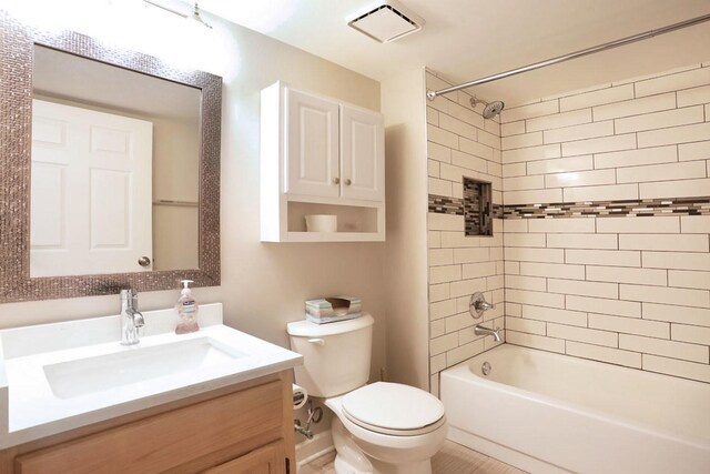 339 Ashford Cir Unit 1, Bartlett, IL 60103 - bathroom with vanity, toilet, and shower / bath combination