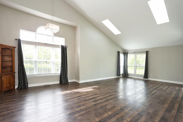 339 Ashford Cir Unit 1, Bartlett, IL 60103 - unfurnished room with a skylight, high vaulted ceiling, dark wood-style floors, baseboards, and a chandelier