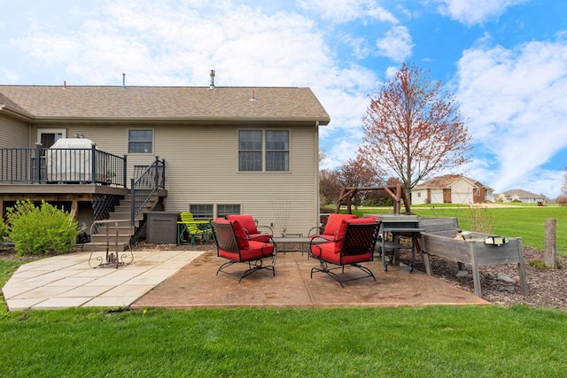 5775 S Indian Trl, Rochelle, IL 61068 - rear view of property with a patio area, a deck, a lawn, stairs, and outdoor lounge area
