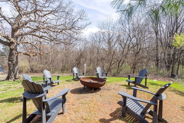 10A52 Cardinal Ct, Apple River, IL 61001 - view of grassy yard featuring a fire pit