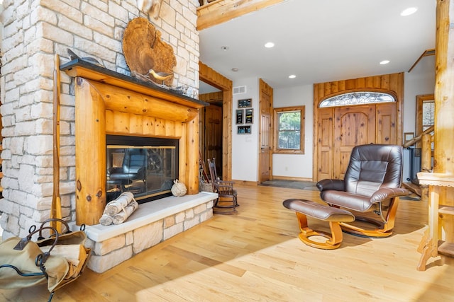 10A52 Cardinal Ct, Apple River, IL 61001 - living area with wood finished floors, recessed lighting, baseboards, and a fireplace