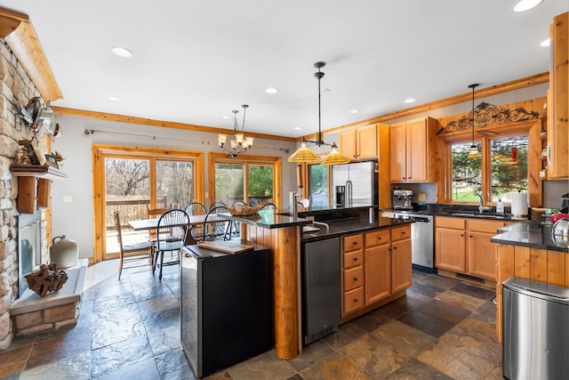 10A52 Cardinal Ct, Apple River, IL 61001 - kitchen with stainless steel appliances, stone tile flooring, healthy amount of natural light, recessed lighting, and a sink