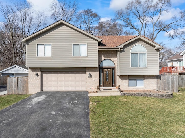 17408 Fisk Ave, East Hazel Crest, IL 60429 - split foyer home with brick siding, an attached garage, asphalt driveway, and a shingled roof