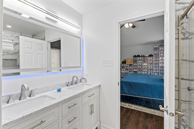 17408 Fisk Ave, East Hazel Crest, IL 60429 - full bathroom featuring double vanity, wood finished floors, a marble finish shower, connected bathroom, and ceiling fan