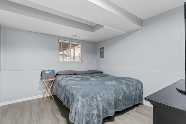 17408 Fisk Ave, East Hazel Crest, IL 60429 - bedroom featuring wood finished floors, baseboards, and electric panel
