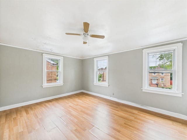 3356 W 84th St, Chicago, IL 60652 - unfurnished room featuring light wood finished floors, plenty of natural light, baseboards, and ornamental molding