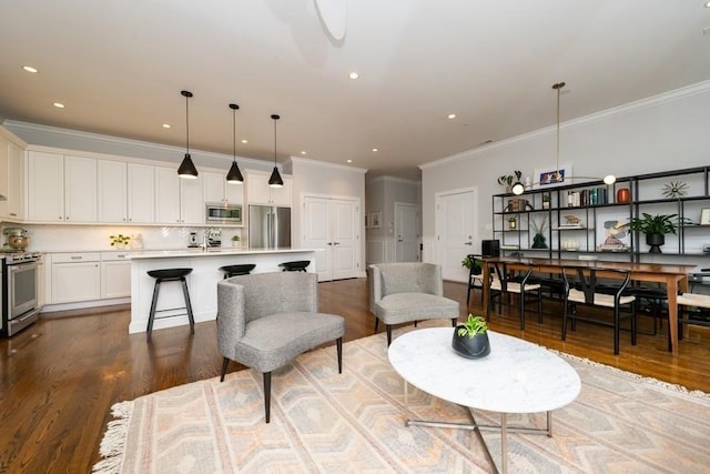742 N Ada St Unit 3S, Chicago, IL 60642 - living area featuring ornamental molding, wood finished floors, and recessed lighting