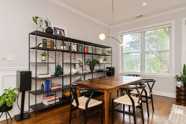 742 N Ada St Unit 3S, Chicago, IL 60642 - dining room featuring wood finished floors, crown molding, and baseboards