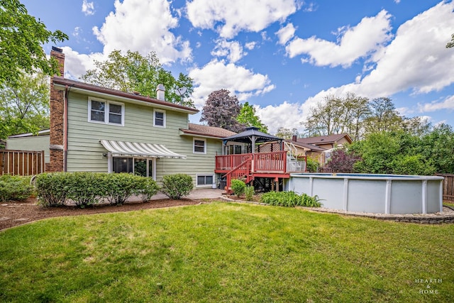 1103 Hillcrest Ave, Fox River Grove, IL 60021 - rear view of house featuring a gazebo, a chimney, a yard, and an outdoor pool