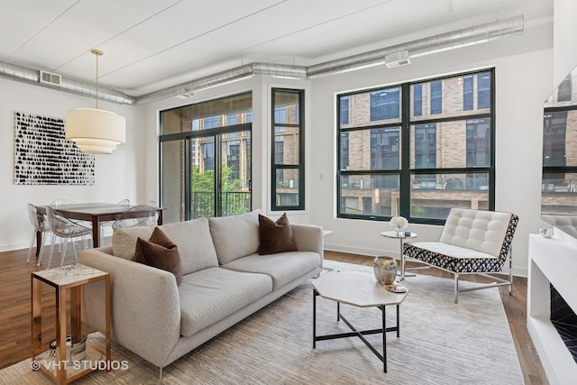 843 W Monroe St Unit 3B, Chicago, IL 60607 - living room with baseboards and wood finished floors