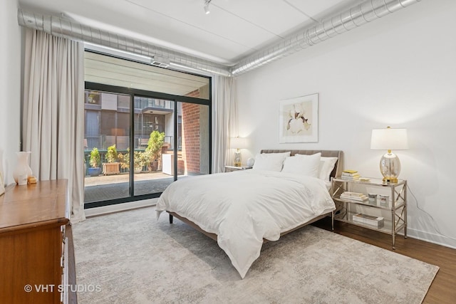 843 W Monroe St Unit 3B, Chicago, IL 60607 - bedroom with access to outside and wood finished floors