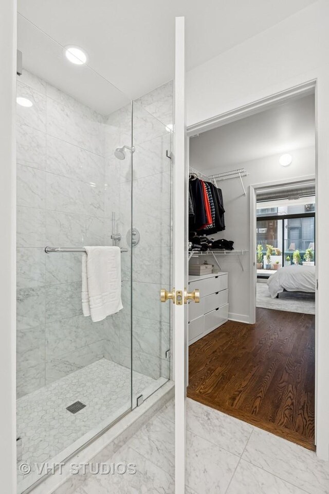 843 W Monroe St Unit 3B, Chicago, IL 60607 - ensuite bathroom with a stall shower and a walk in closet