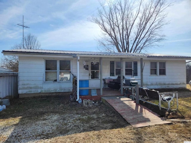 1558 N 2700th Ave, Loraine, IL 62349 - view of front of house featuring covered porch and metal roof