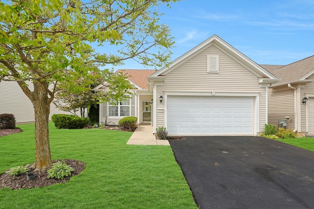 13538 Lehigh St, Huntley, IL 60142 - single story home with driveway, a garage, and a front yard