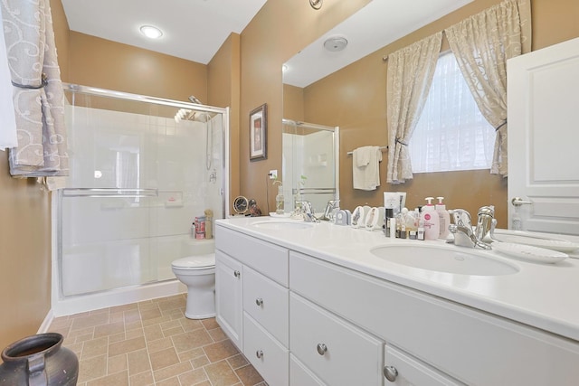 13538 Lehigh St, Huntley, IL 60142 - full bathroom featuring a stall shower, double vanity, and toilet