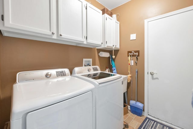13538 Lehigh St, Huntley, IL 60142 - laundry area featuring independent washer and dryer and cabinet space